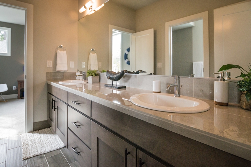 A vanity with two sinks increases both counter space and storage in your bathroom.  